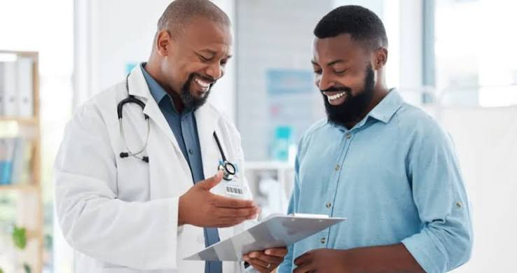 Dr. Rabkin reviewing a patient chart